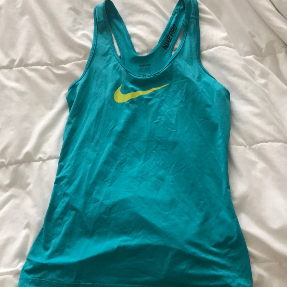 Turquoise Nike Pro workout tank.
